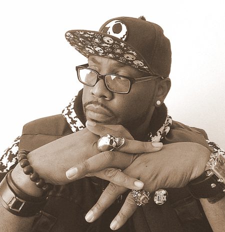 DJ VooDoo stares pensively into the distance.