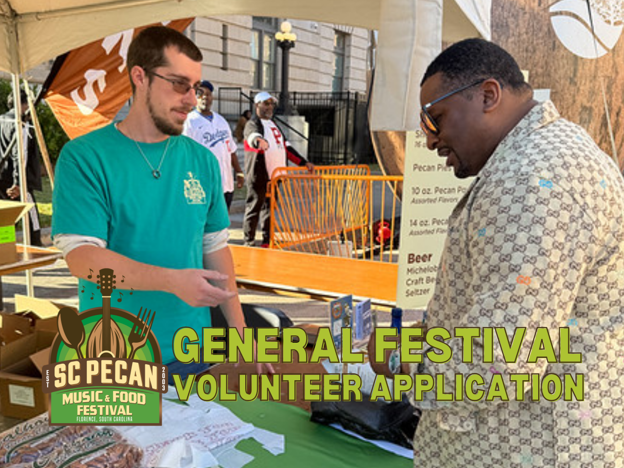 volunteer conducts transaction at a pecan festival booth